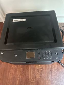 This is a Brother HL-L2395DW compact monochrome laser printer featuring a flatbed scanner and wireless networking capabilities.
