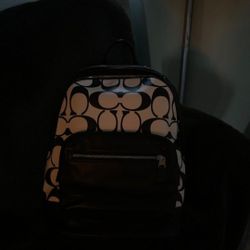 White And Black Coach Backpack