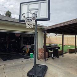 Basketball hoop adjustable