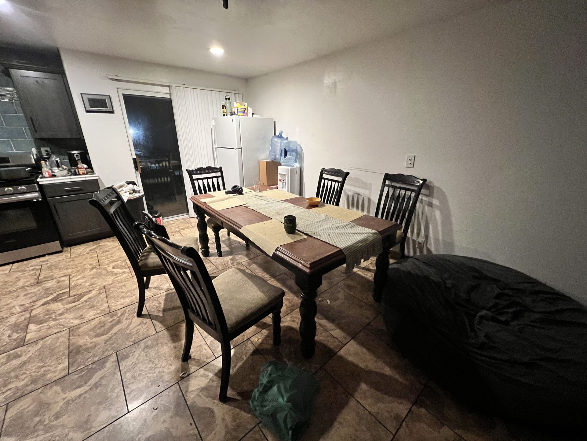 Table + 6 Chairs (price negotiable)