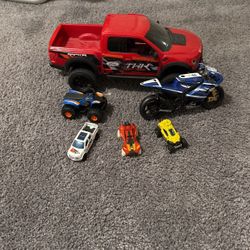 Toy cars for kids! 1 big sized truck,quad,and motorcycle and 3 off-road hot wheels!