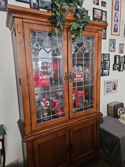 Antique oak China hutch with leaded glass doors.