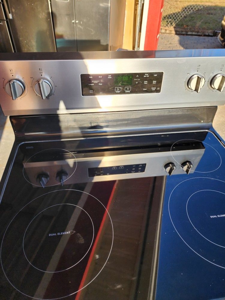 Set New Whirlpool Stove,Dishwasher And Microwave