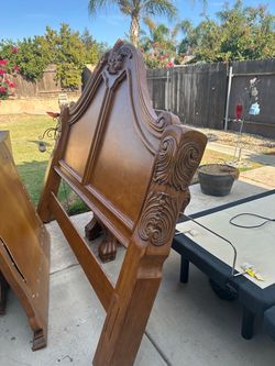 Four poster bed room set and tv hutch.