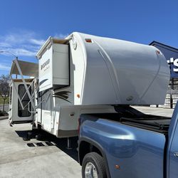 2011 Fifth wheel travel trailer 31 foot three slide outs