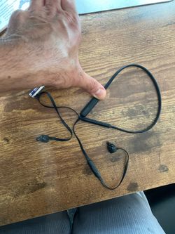 Broken BeatsX wireless headphones
