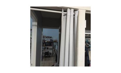 Curtains and curtain rods, various lengths, sold as a set