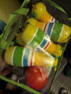 Melissa & Doug Sunny Patch Giddy Buggy Bowling Pins.