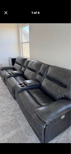 Beautiful elegant upscale luxury Italian Leather All Electric Powered Triple Recliner Sofa