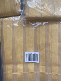 A set of 3 gold curtains