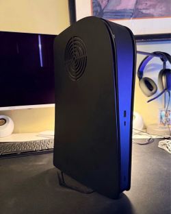 Perfectly working PS5 basically new clean with extra storage and a nice little cover that lets air flow perfect