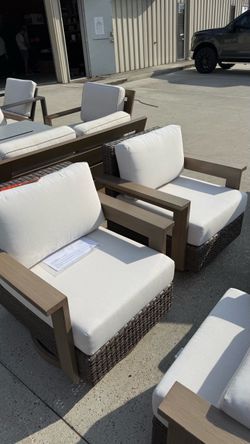 Agio Juniper 2-Piece Outdoor Patio Swivel Glider Chairs Upgrade your patio with this beautiful set of 2 swivel glider chairs