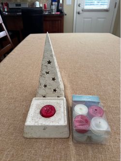 Candle, candle holder