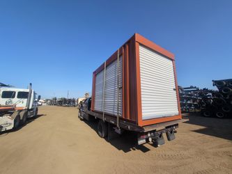 15ft container with roll up door and 10ft roll up door on the side