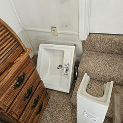 Sink And Pedestal And Faucet