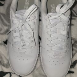 Ladies White On White Puma Sneakers 