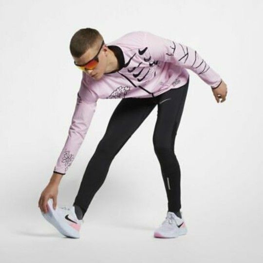 NIKE NATHAN BELL PRINT RUN TRACK PACKABLE PINK DOODLE JACKET