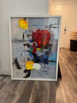 Large glass and canvas mix framed art.
