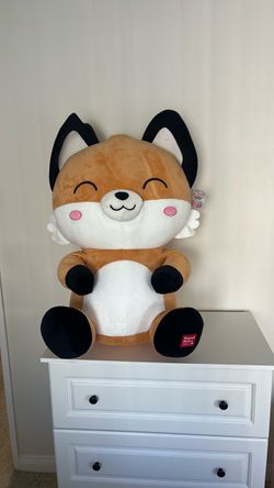 Giant fox stuffed animal with tag