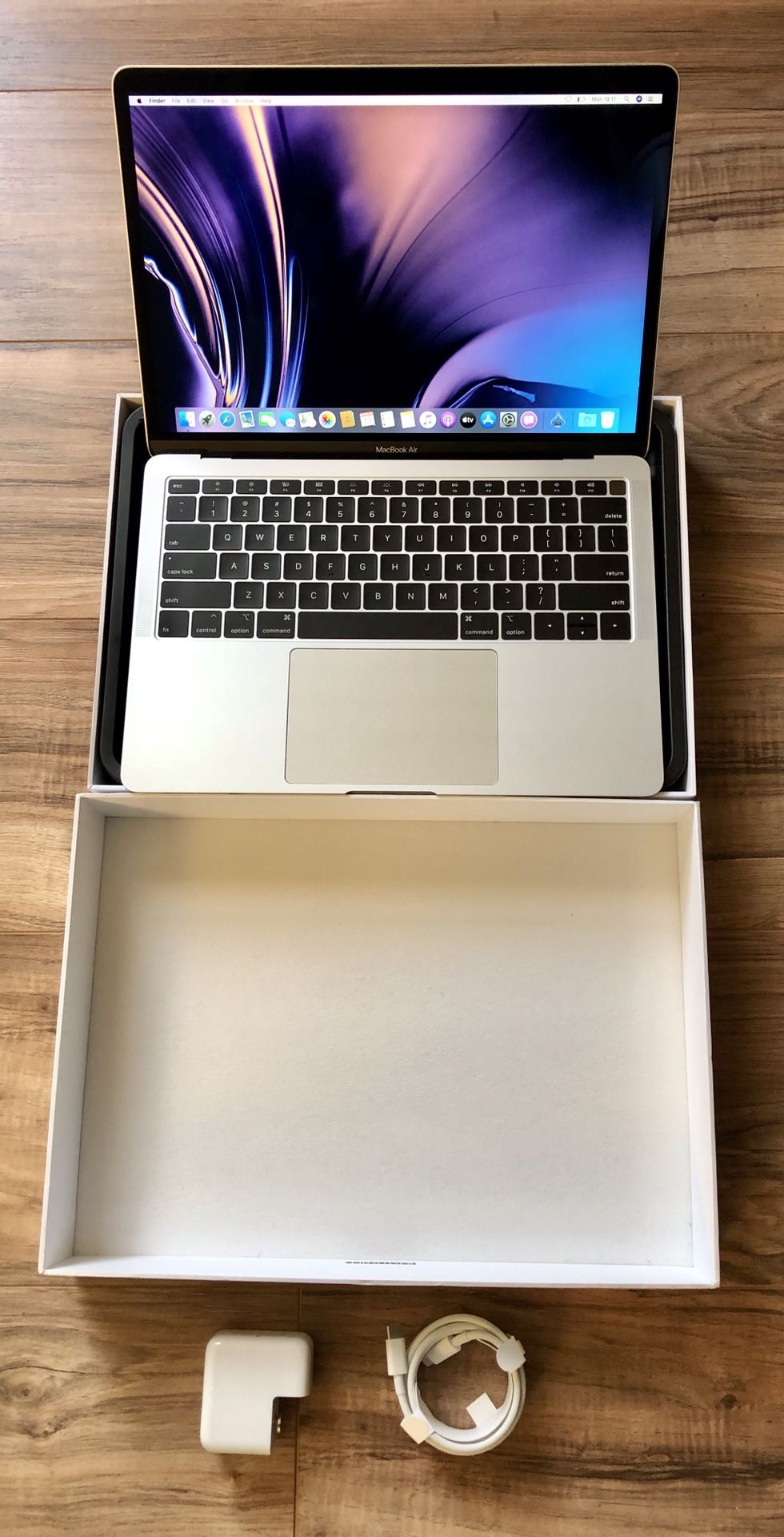 Feb 2019 MacBook w/Touch ID Retina Core i5 13” Display lighter than 2020 13” Pro