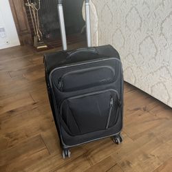 American Tourister luggage..