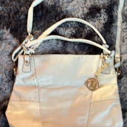 Other Really Nice Purses, Along With A Tory Burch Suede
