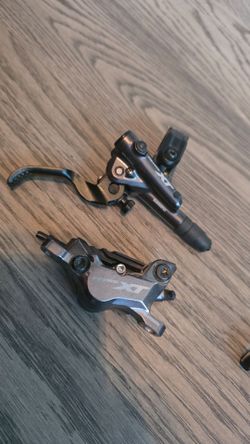 Shimano xt Trail brake m8120 front and rear.  Mountain bike