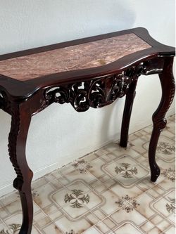 Cherry wood style wall table.