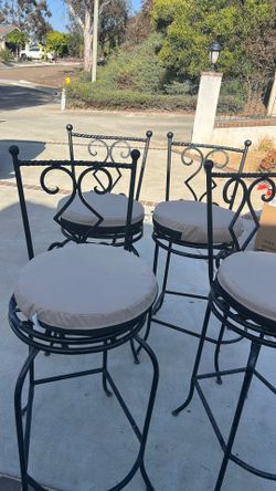 4 Bar  chairs on swivel.