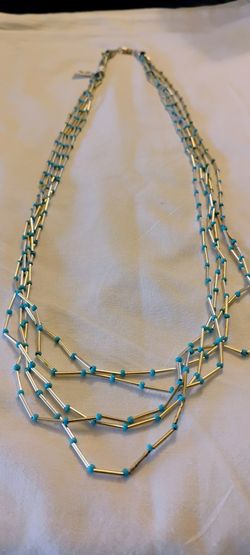 Lovely weight Native American liquid silver necklace, 24” long.