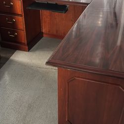 A Set Of An L Shaped Desk A Bookcase And A Filing Cabinet