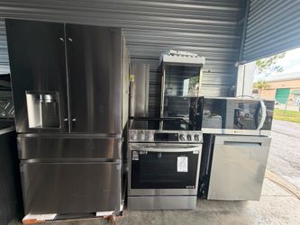 Complete new stainless steel kitchen set LG refrigerator, stove, microwave, dishwasher
