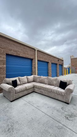 Ashley’s 2 piece Beige Sectional sofa couch