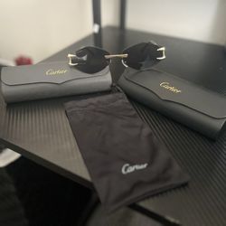Black/Gold Cartier Glasses/Shades