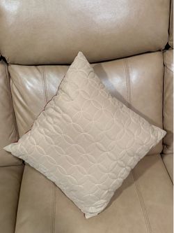 Double sided tan/red decorative pillow - 15 by 15 inches