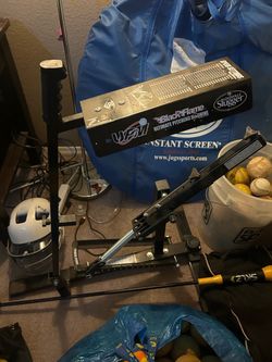 Louisville slugger pitching machine, net, youth softball, bat,helmet