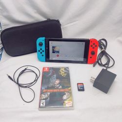 Nintendo Switch 32GB - Neon Red/Neon Blue + Case and Two Games 