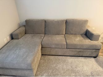 Living Spaces Gray Sectional w/ Reversible Chaise