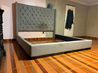 Gray Upholstered Bed Frame with Tufted Headboard