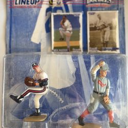 1997 Kenner Starting Lineup "Classic Doubles" action figure set featuring Hall of Fame pitchers Greg Maddux and Cy Young.