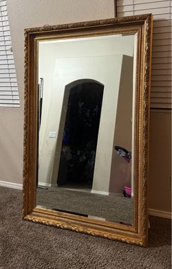 Gold mirror