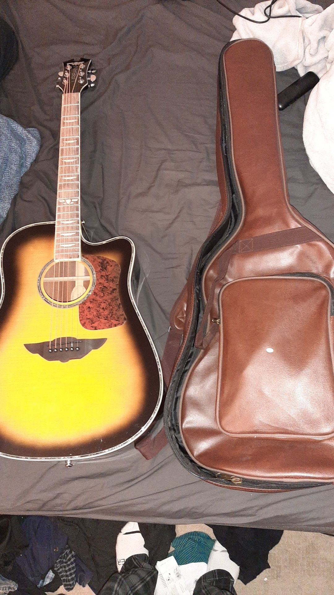 Keith Urban acoustic guitar with leather case brand new.
