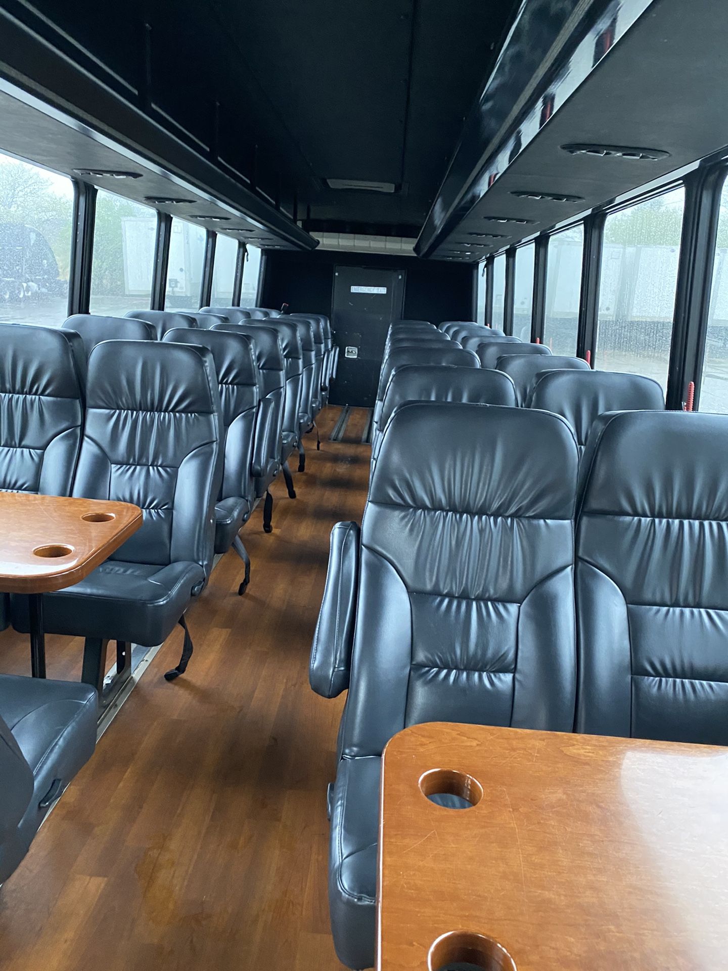 (Bus seats) Black leather seats with tables good for all kind of projects