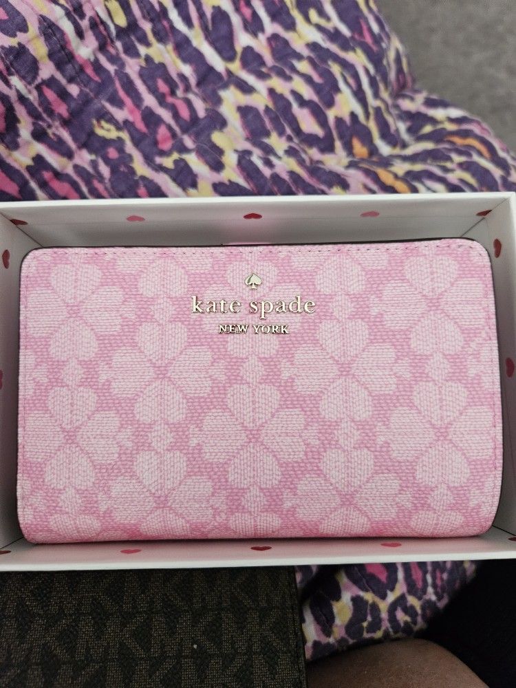 KATE SPADE WALLET NEW......
