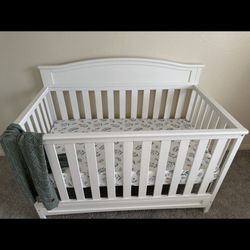 Delta Children Emery 4-in-1 Convertible Baby Crib & Changing Table