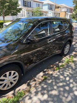 Nissan Rogue SUV – Dark Brown/Black