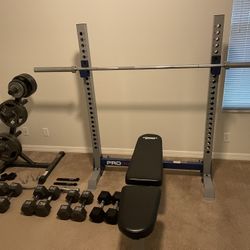 Fitness Gear Olympic weight bench with bars and weights. Like new condition. Everything in the pictures will be included:  -Weight Bench (Squat rack o