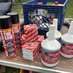 Toyota Oil Filters And 3 Quarts Of Red Line Oil And Two Cans Of Wheel Bright Conditioner