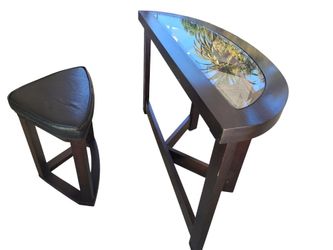 half-moon table and stool made of wood and glass