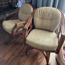 Pair Of Vintage Rattan Rolling Chairs 